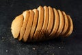 Isolate of white loaf of bread with sliced Ã¢â¬â¹Ã¢â¬â¹pieces on a black background Royalty Free Stock Photo